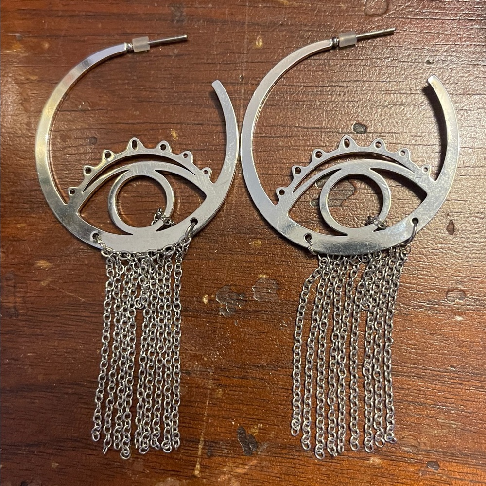 Christian Siriano silver toned earrings.